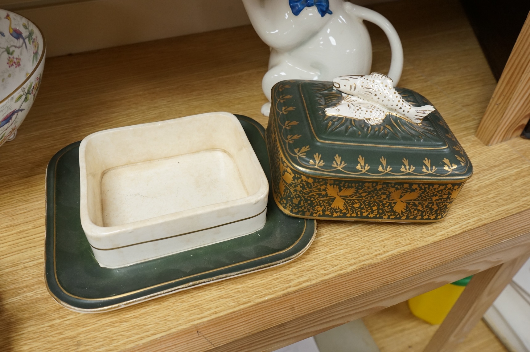 A collection of porcelain and pottery to include commemorative china, a leaf dish and group of wade figures, largest 29cm in diameter